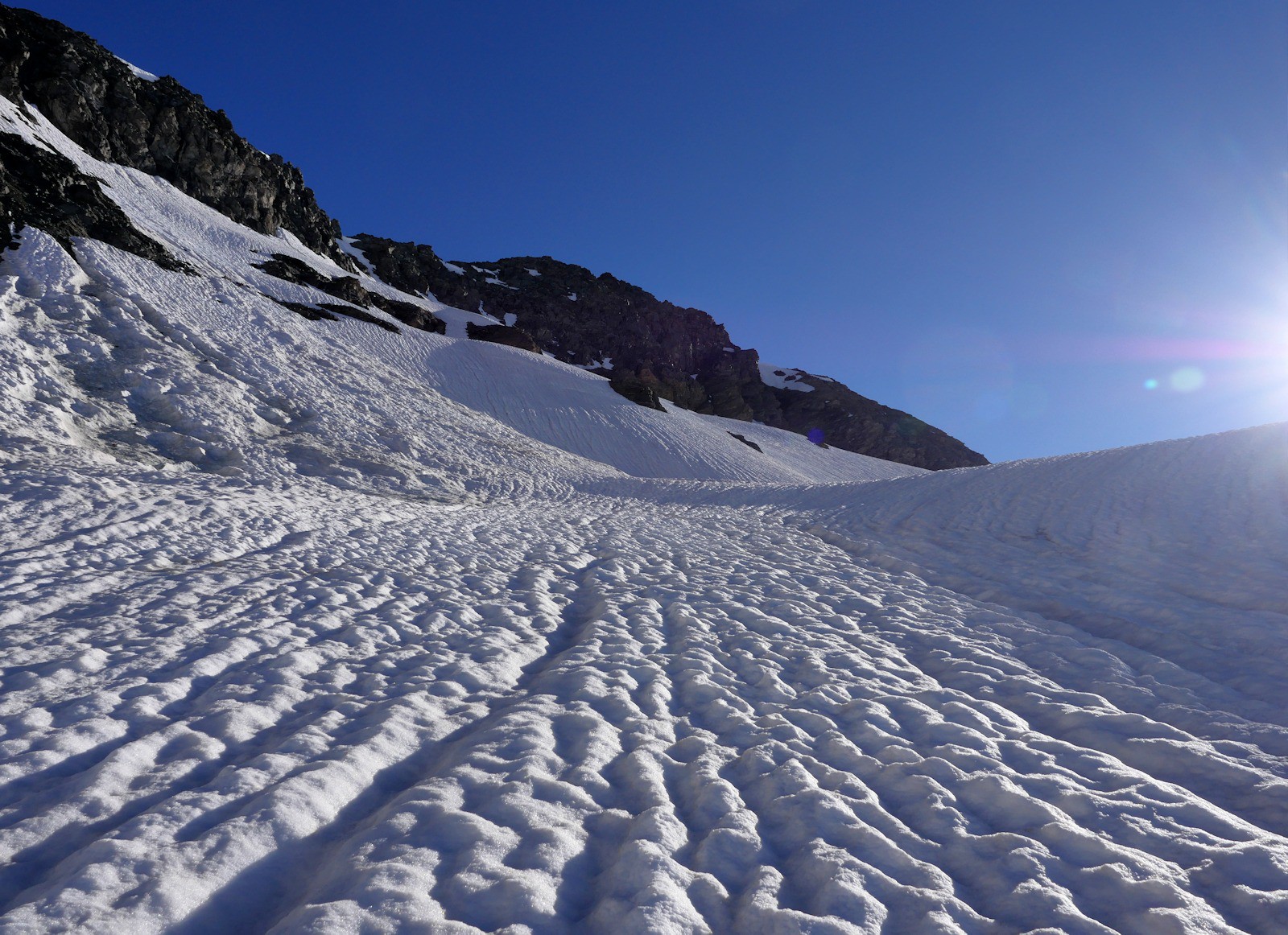 #11 Montée vers le Col du Mottet sur une neige bien bosselée. Montée vers le Col du Mottet sur une neige bien bosselée.